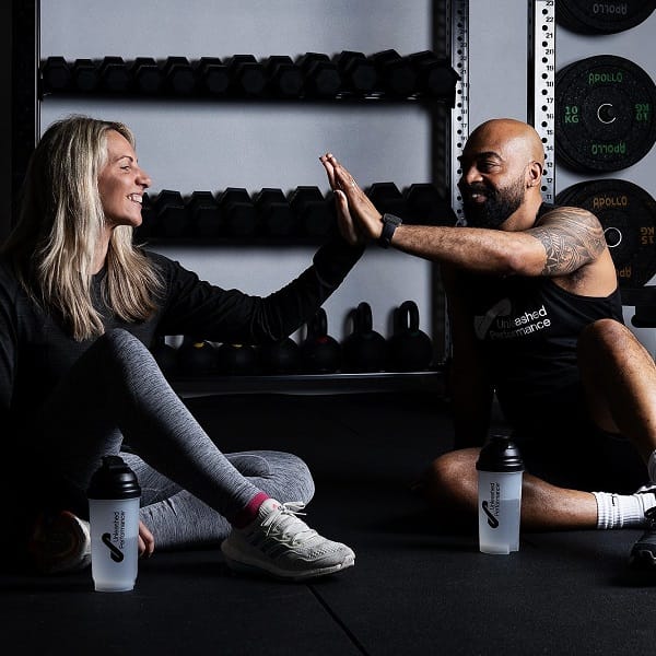 Two UP members motivating each other for success